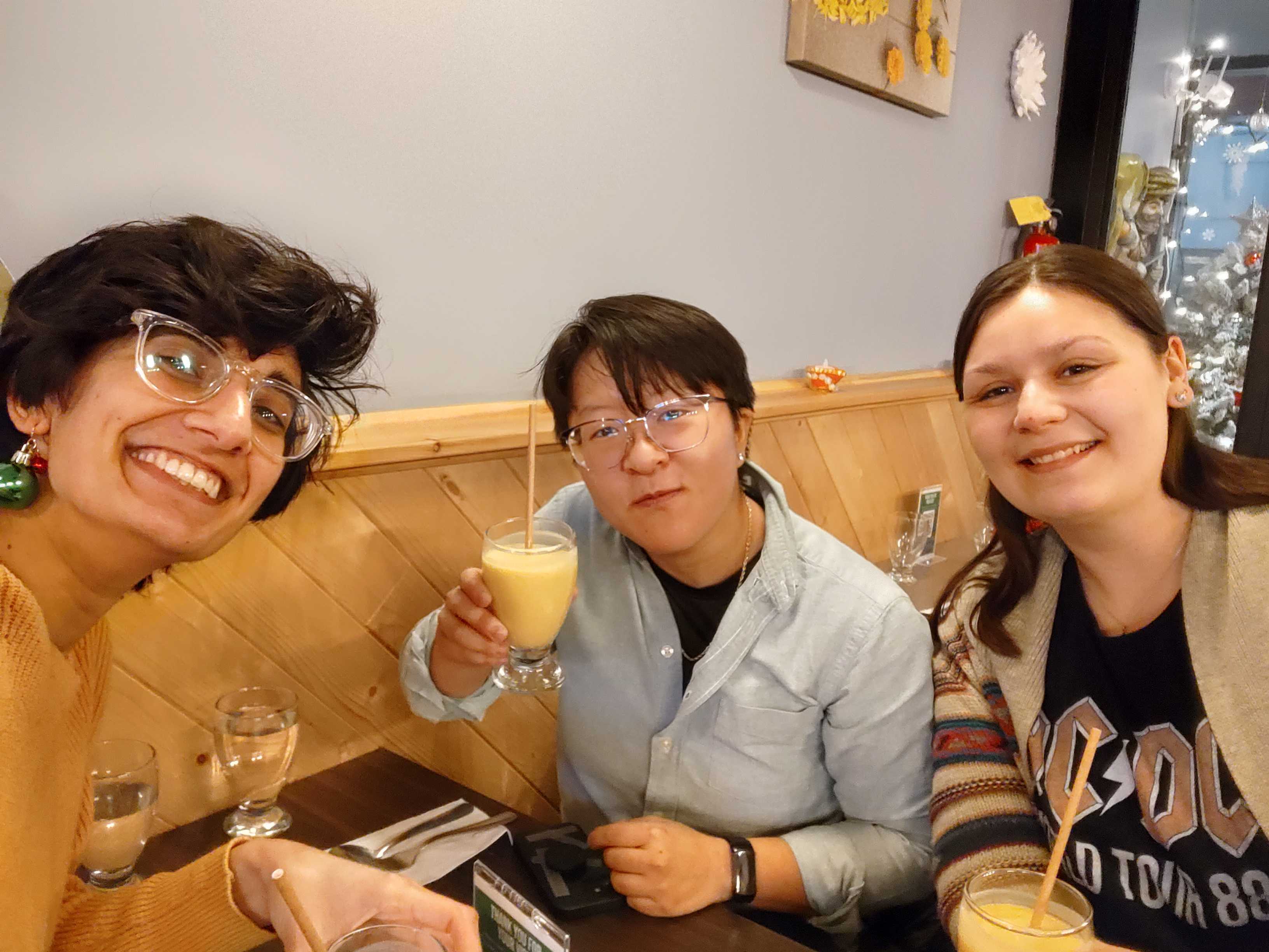 Niki, Deanne and Hailey celebrating infograph contest success